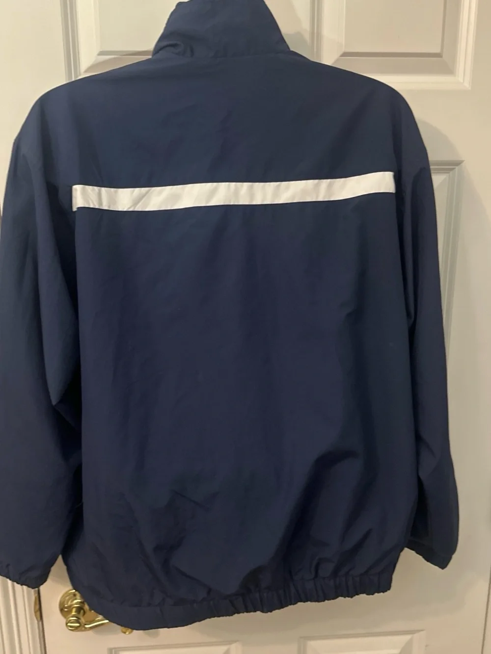 Vintage 1990’s Nike Men’s Navy Track Jacket with White Accents